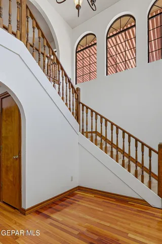 a view of a room with window and wooden floor