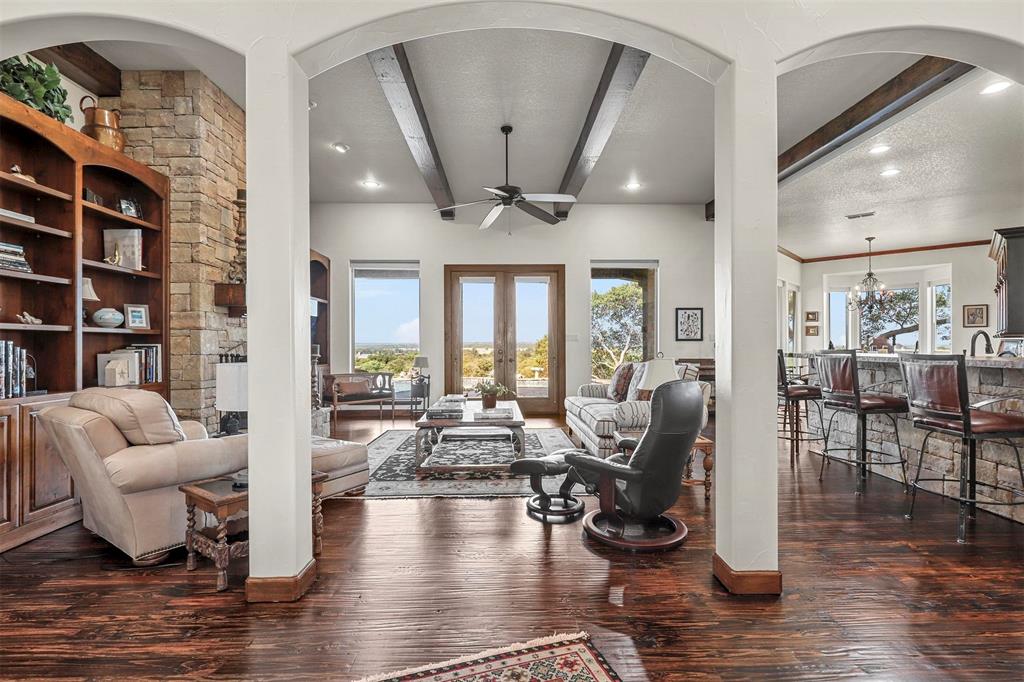 701 Cactus Rio Weatherford, TX 76087 - Photo 11 of 40 a living room with furniture or wooden floor and a large window