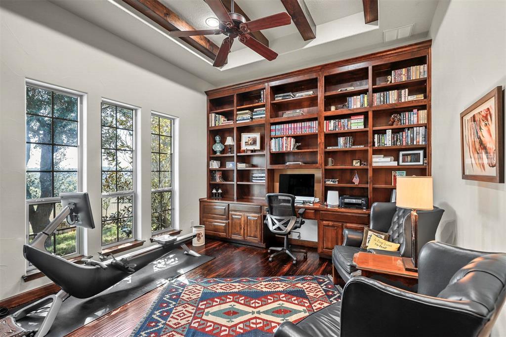 701 Cactus Rio Weatherford, TX 76087 - Photo 18 of 40 a living room with furniture and a floor to ceiling window