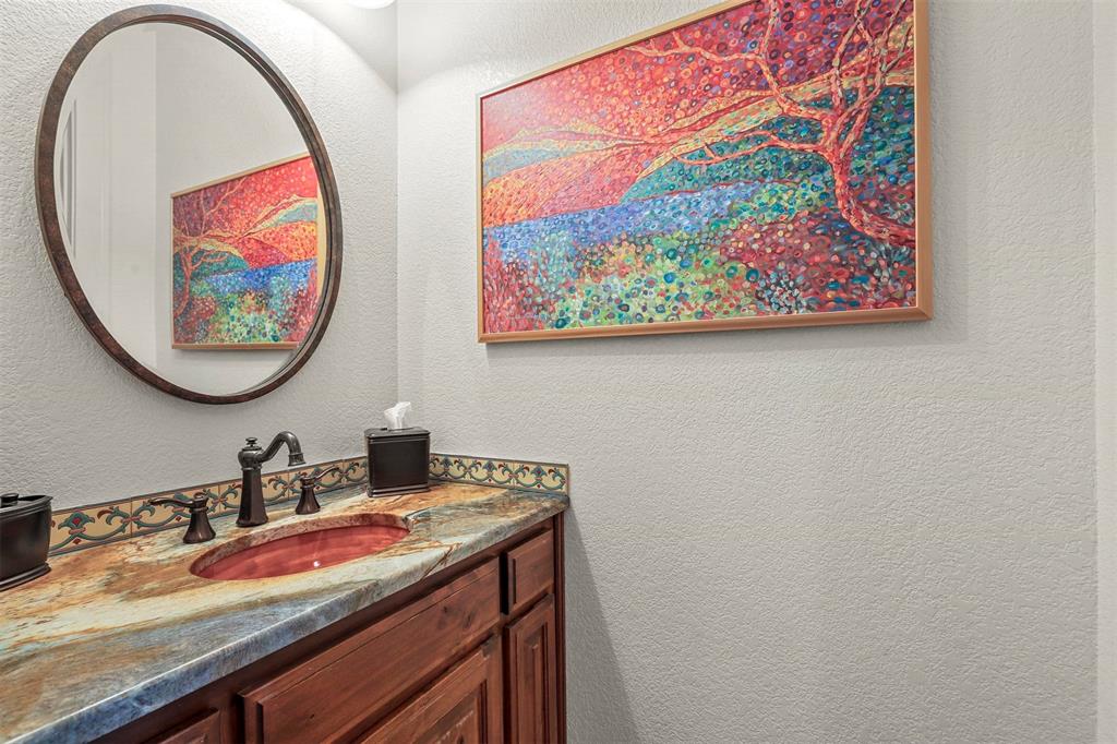 701 Cactus Rio Weatherford, TX 76087 - Photo 25 of 40 a bathroom with a sink and a mirror