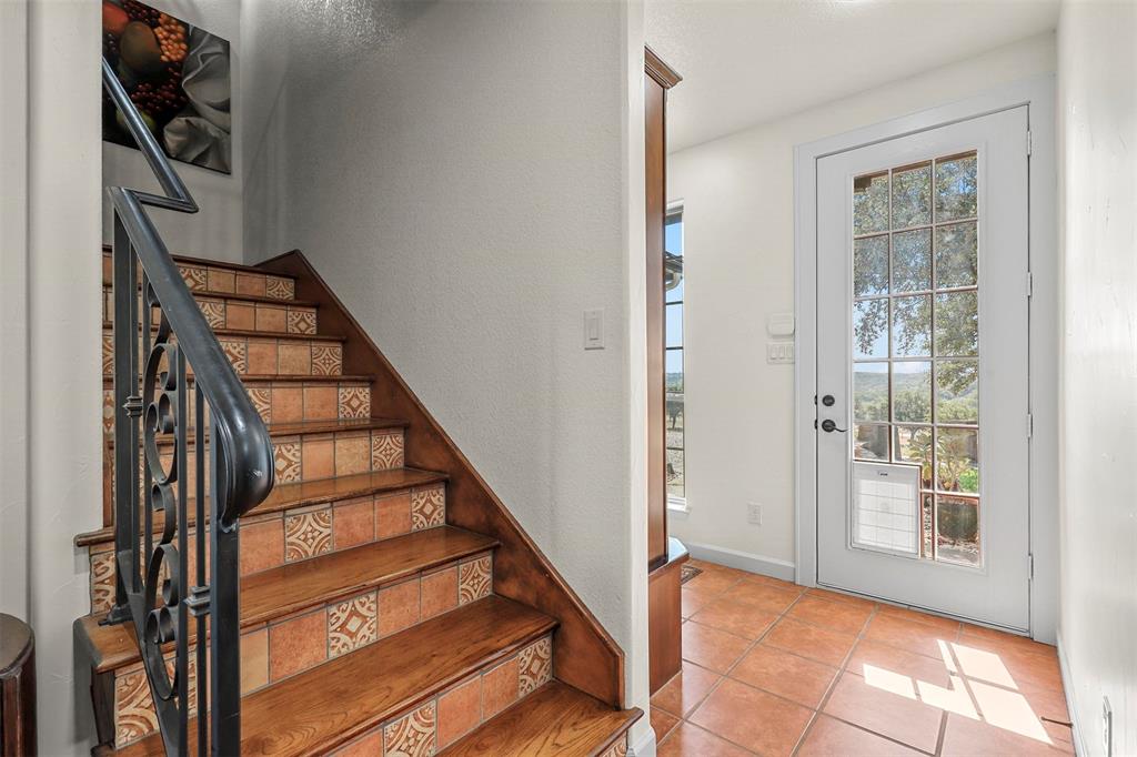 701 Cactus Rio Weatherford, TX 76087 - Photo 28 of 40 a view of an entryway with staircase