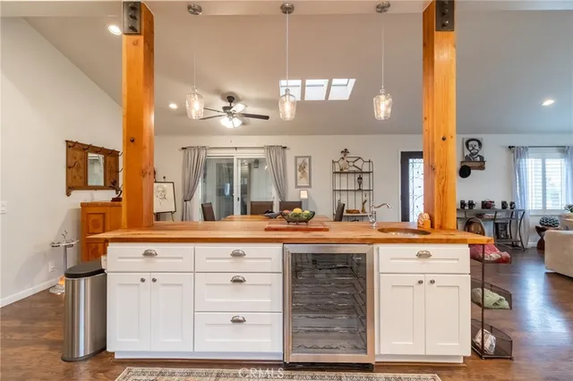 a open kitchen with stainless steel appliances granite countertop a stove and cabinets