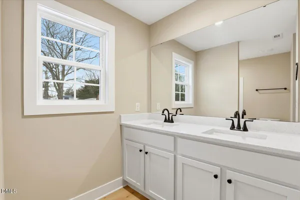 an empty room with closet area