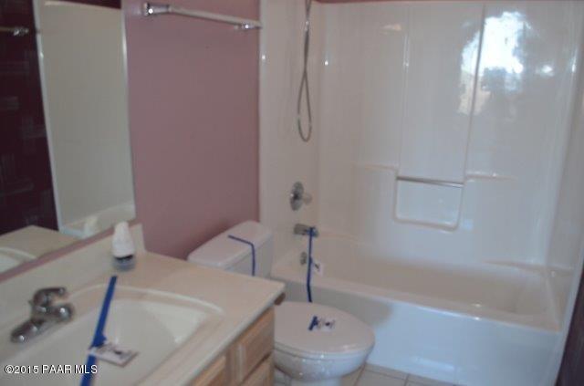 425 Buckskin Road Prescott, AZ 86301 - Photo 14 of 24 a bathroom with a sink and a tub
