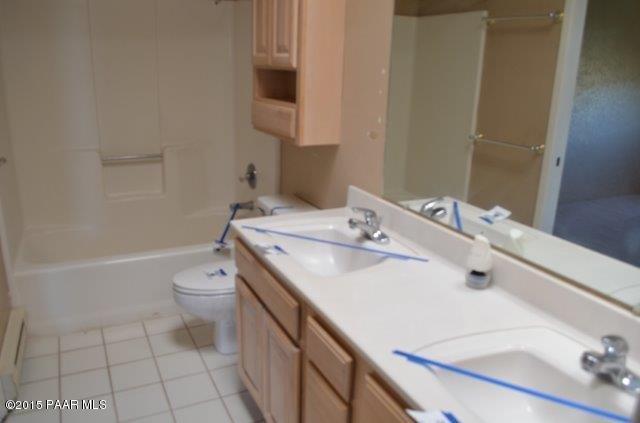 425 Buckskin Road Prescott, AZ 86301 - Photo 17 of 24 a bathroom with a sink toilet and shower