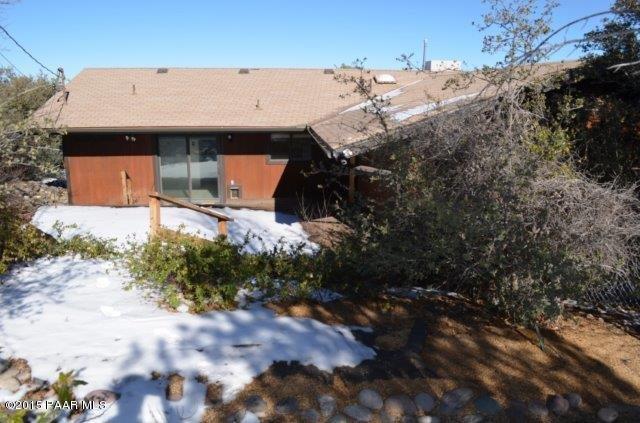 425 Buckskin Road Prescott, AZ 86301 - Photo 23 of 24 a view of a house with a yard