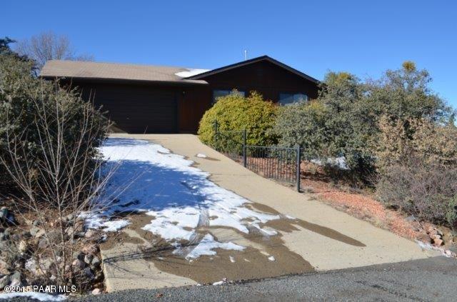 425 Buckskin Road Prescott, AZ 86301 - Photo 5 of 24 a front view of a house with a yard