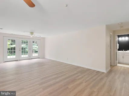 a huge green field with lots of trees