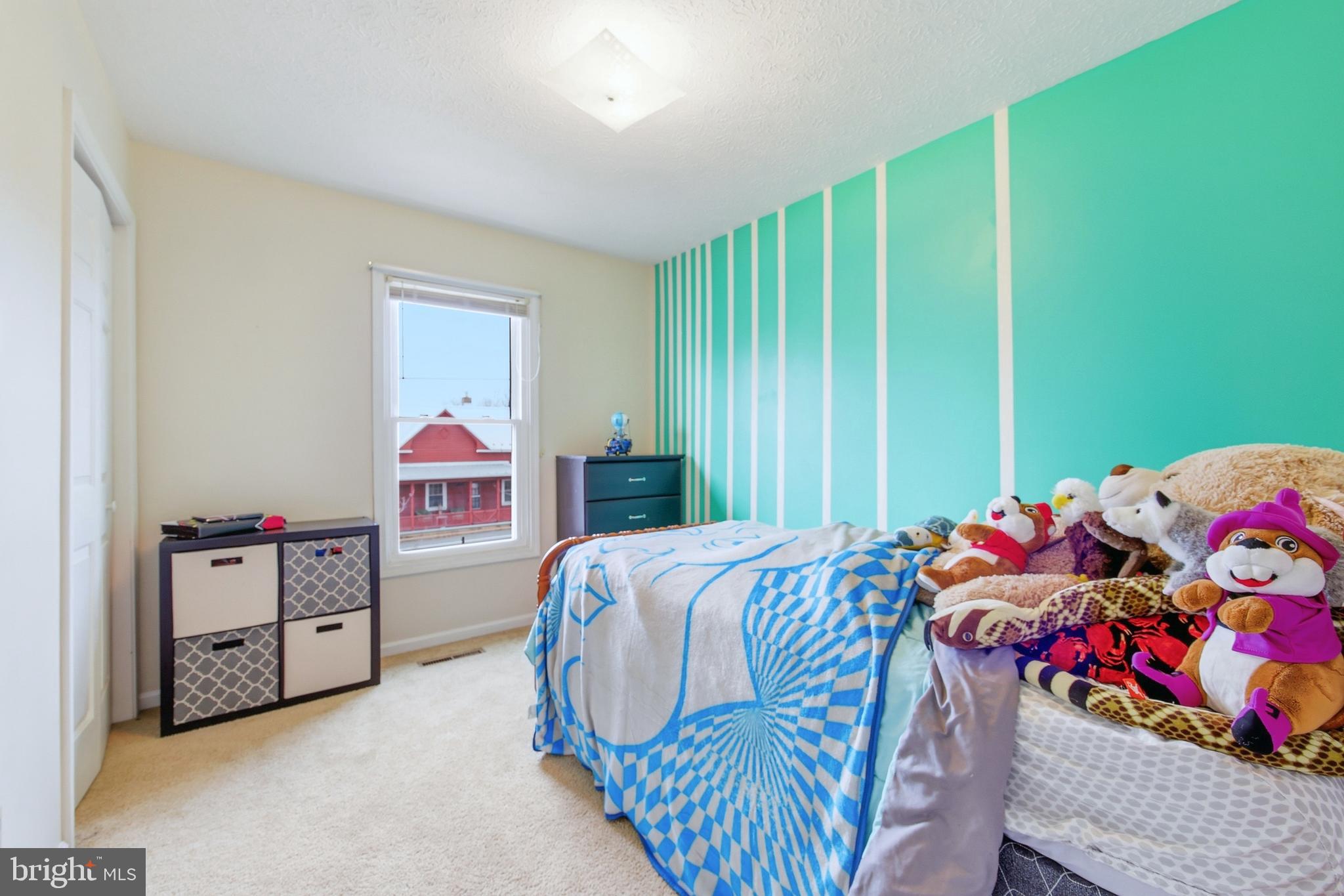 522 South Main Street Mount Crawford, VA 22841 - Photo 21 of 57 a bedroom with a bed and a window
