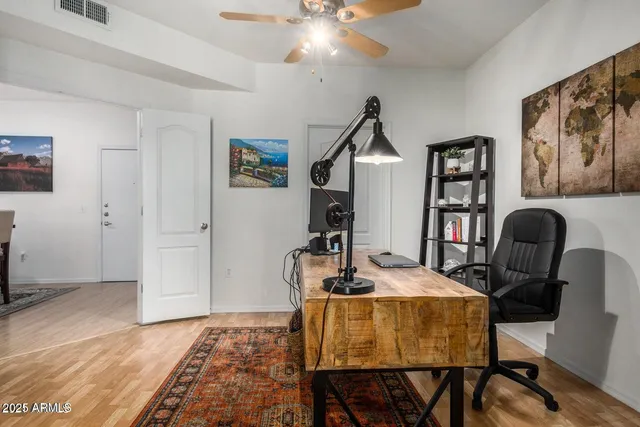a view of a livingroom with furniture and window