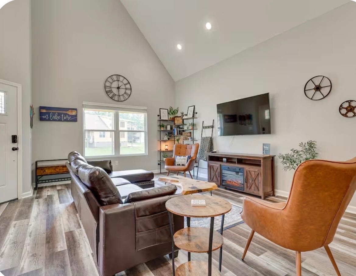 110 Bogey Loop Counce, TN 38326 - Photo 2 of 18 Spacious living area featuring a vaulted ceiling and recessed lighting