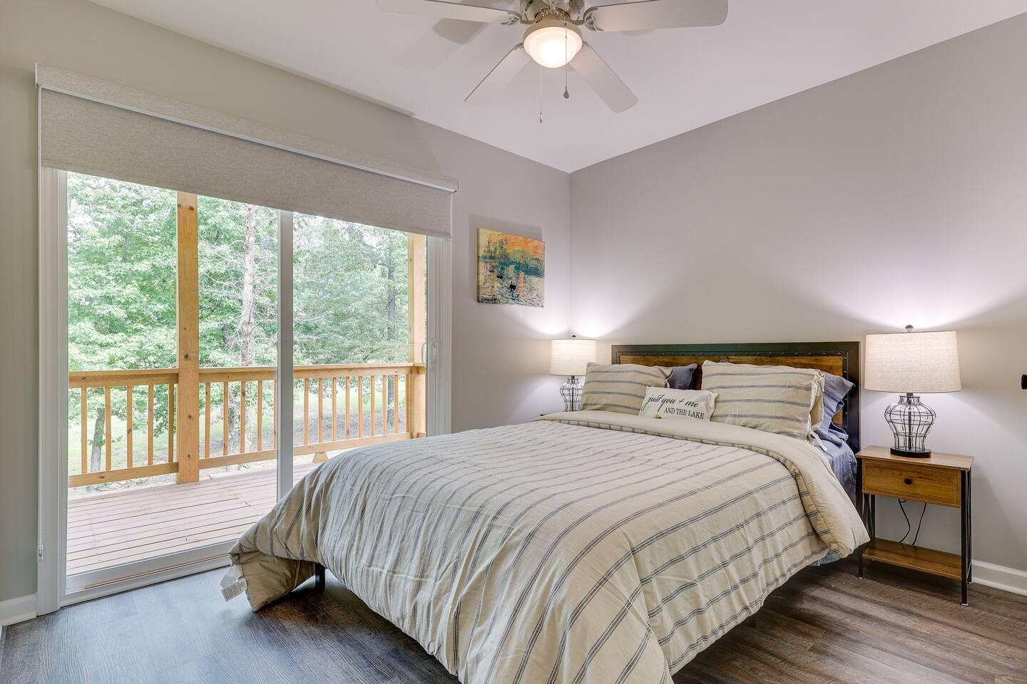 110 Bogey Loop Counce, TN 38326 - Photo 10 of 18 Bedroom with access to outside, wood finished floors, and a ceiling fan