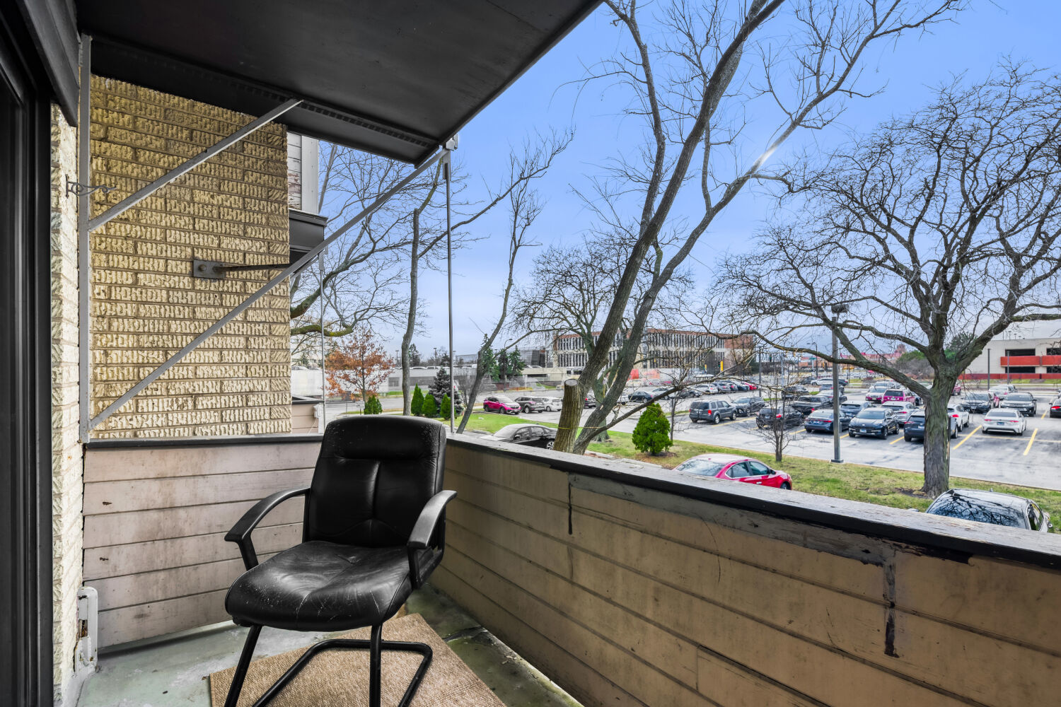 1710 Dempster Street, Unit B Park Ridge, IL 60068 - Photo 19 of 27 a view of a bench in a balcony