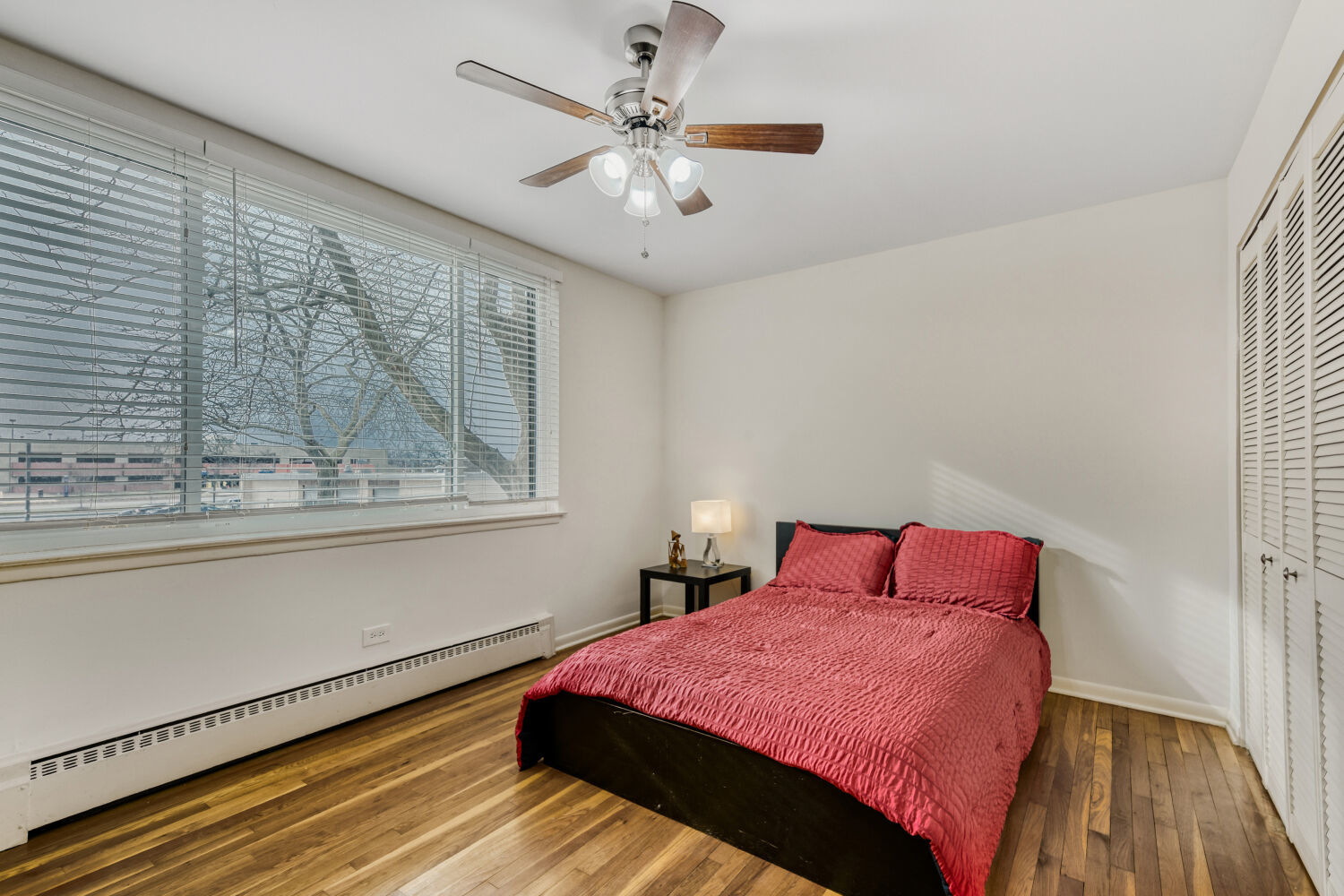 1710 Dempster Street, Unit B Park Ridge, IL 60068 - Photo 21 of 27 a bedroom with a bed and window