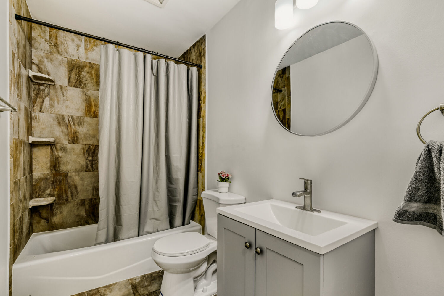 1710 Dempster Street, Unit B Park Ridge, IL 60068 - Photo 27 of 27 a bathroom with a sink toilet and shower