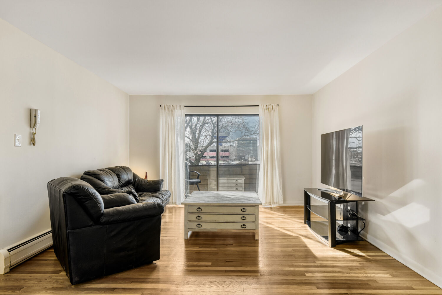 1710 Dempster Street, Unit B Park Ridge, IL 60068 - Photo 6 of 27 a living room with furniture and a fireplace