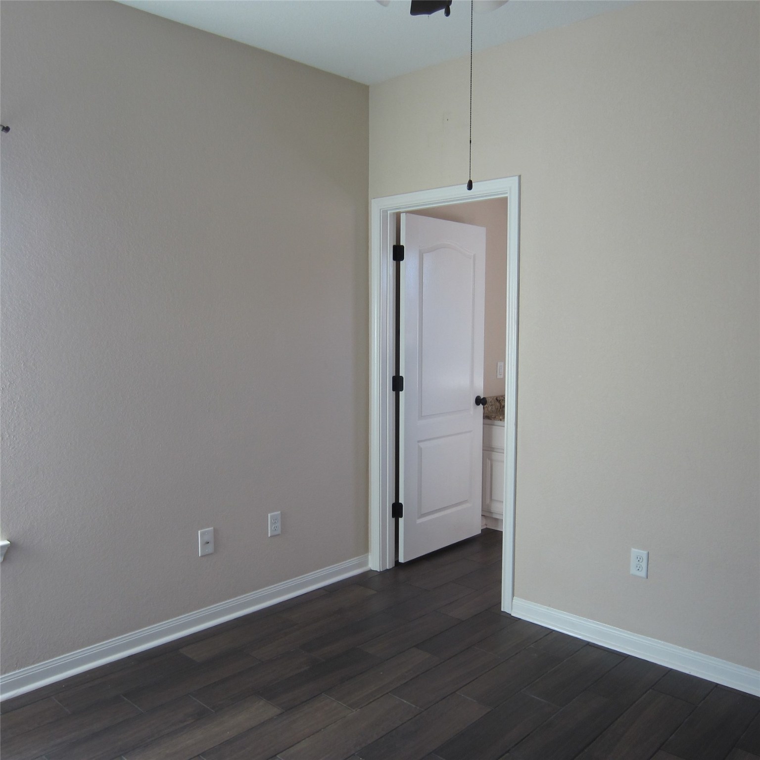 23431 Mcspadon Road, Unit 23415 Porter, TX 77365 - Photo 8 of 10 an empty room with wooden floor and closet