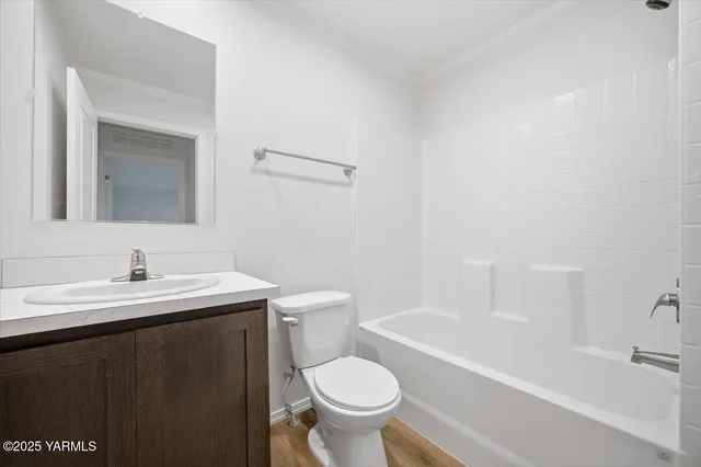a bathroom with a sink a toilet and a bathtub