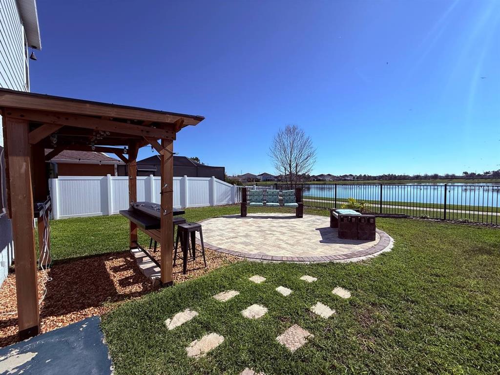 14112 Poke Ridge Drive Riverview, FL 33579 - Photo 24 of 32 a view of a swimming pool with a patio