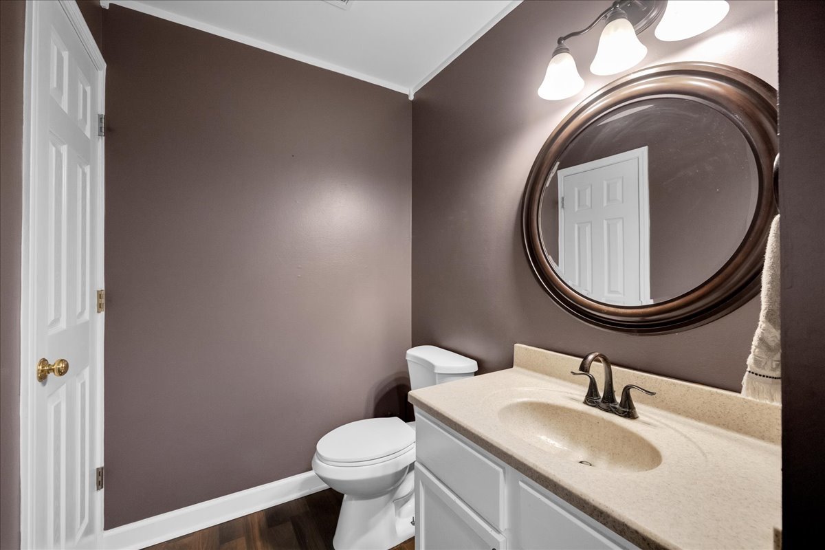 911 Fawn Ridge Court, Unit B Yorkville, IL 60560 - Photo 16 of 37 a bathroom with a sink and a toilet