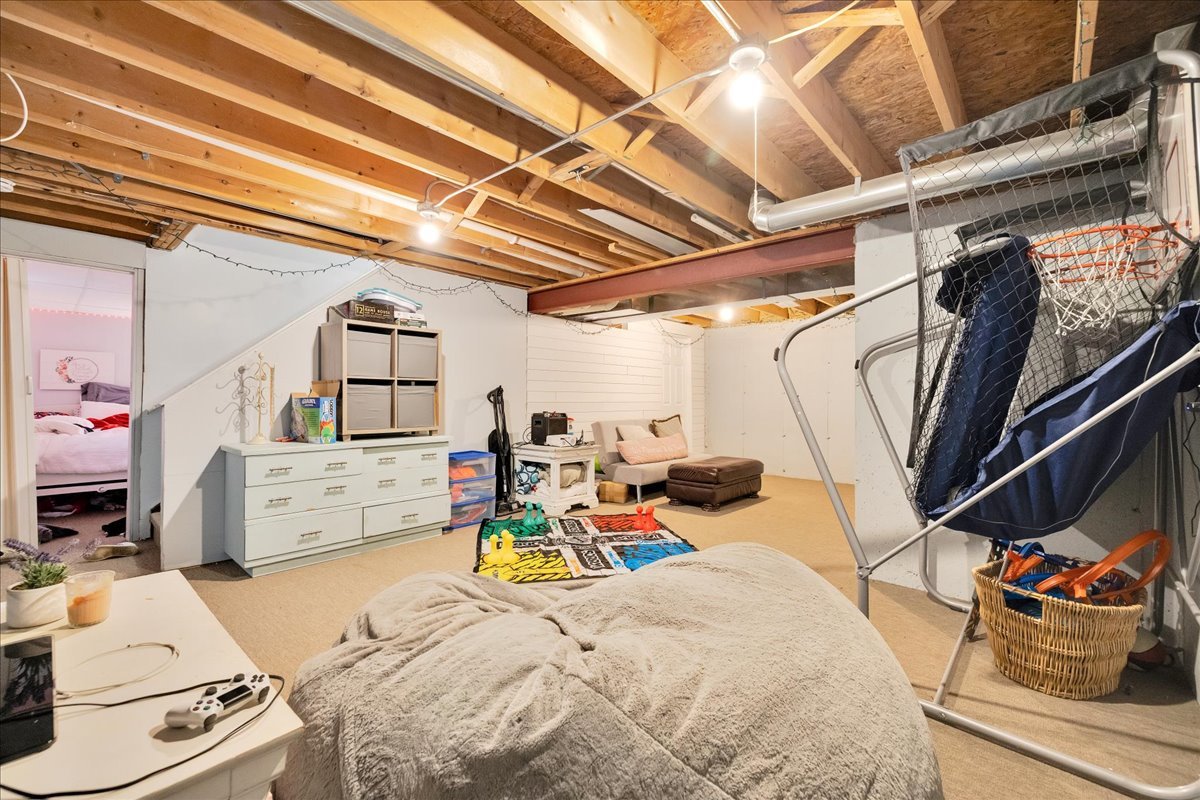 911 Fawn Ridge Court, Unit B Yorkville, IL 60560 - Photo 30 of 37 a storage room with furniture and a window
