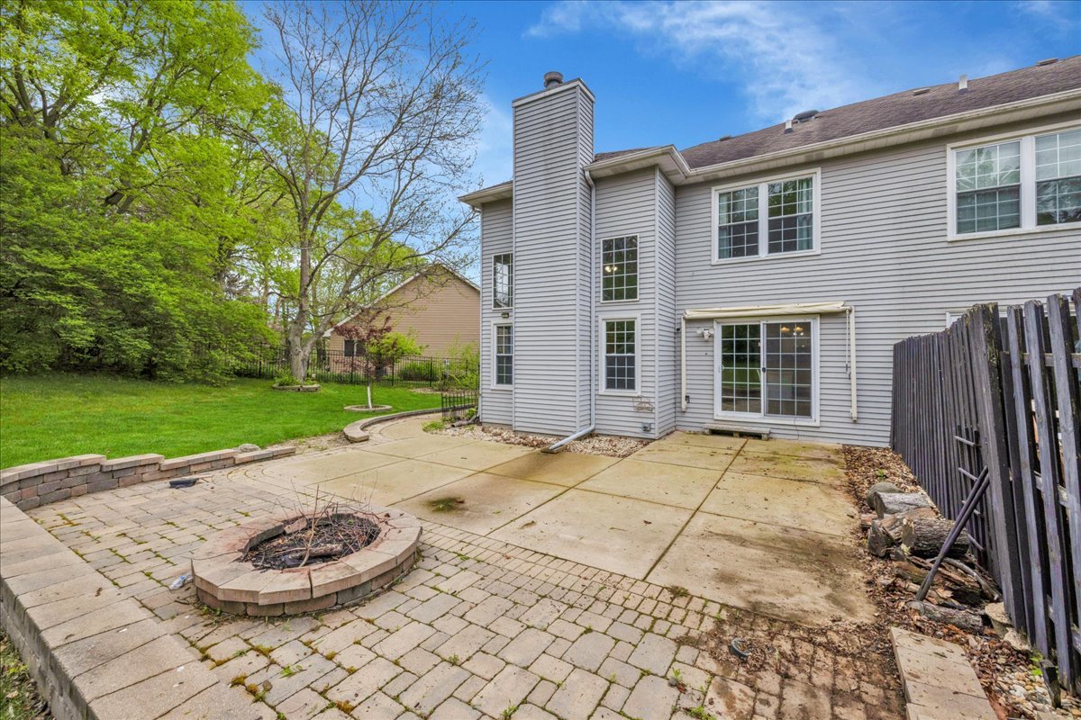 911 Fawn Ridge Court, Unit B Yorkville, IL 60560 - Photo 34 of 37 a view of a backyard with plants and plants