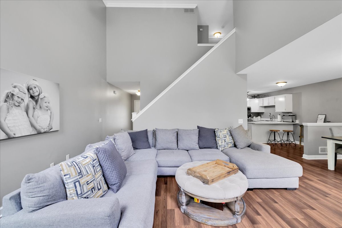 911 Fawn Ridge Court, Unit B Yorkville, IL 60560 - Photo 5 of 37 a living room with furniture and wooden floor