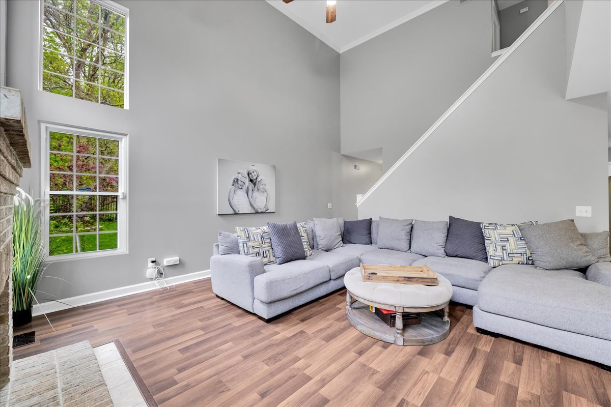 911 Fawn Ridge Court, Unit B Yorkville, IL 60560 - Photo 6 of 37 a living room with furniture and a window