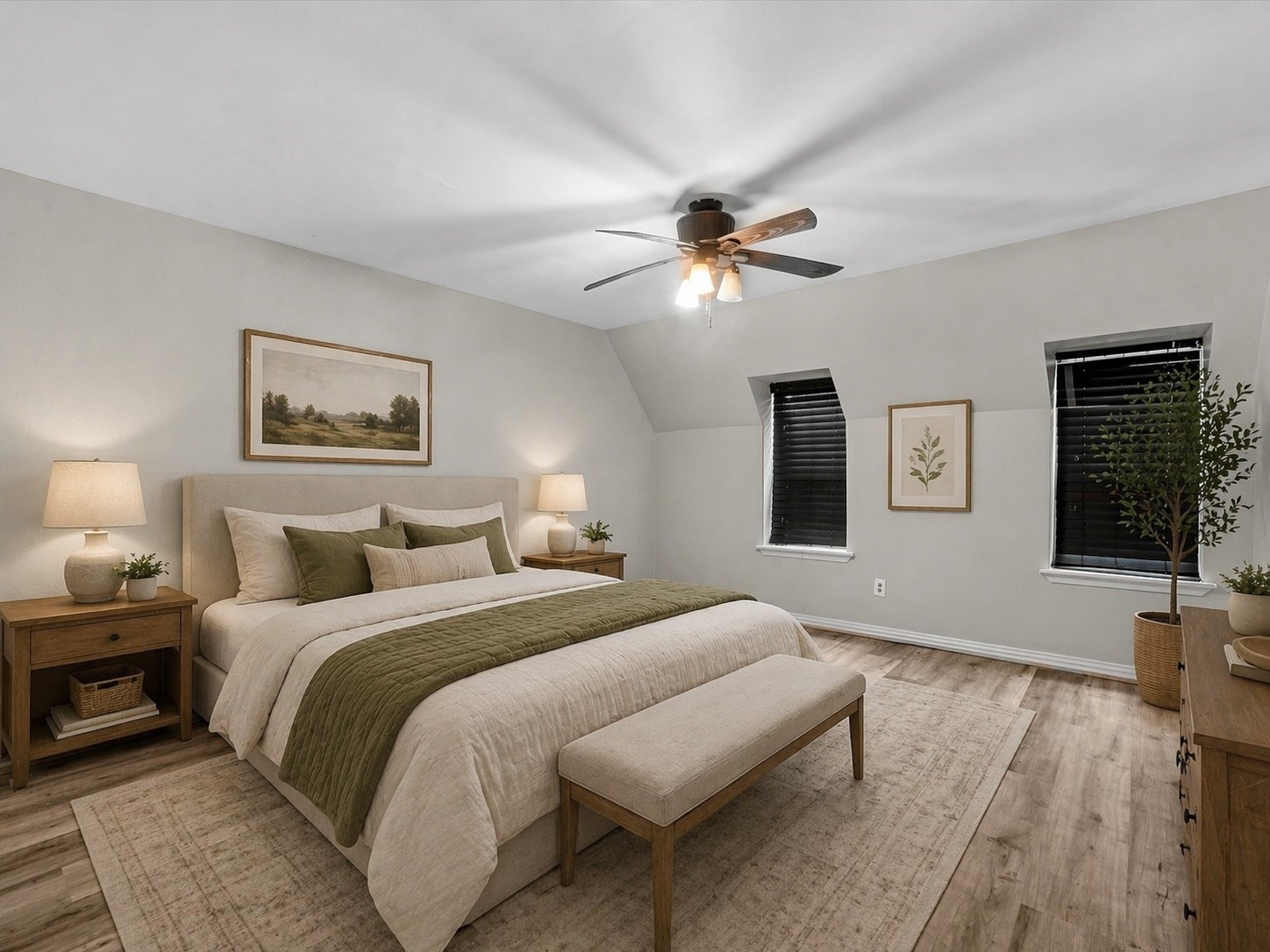 2647 Marilee Lane Houston, TX 77057 - Photo 5 of 26 a spacious bedroom with a bed a couch and a flat screen tv