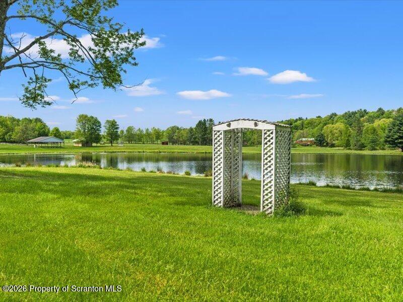 9-17 Vago Road Tunkhannock, PA 18657 - Photo 51 of 57 a view of a golf course with a lake view