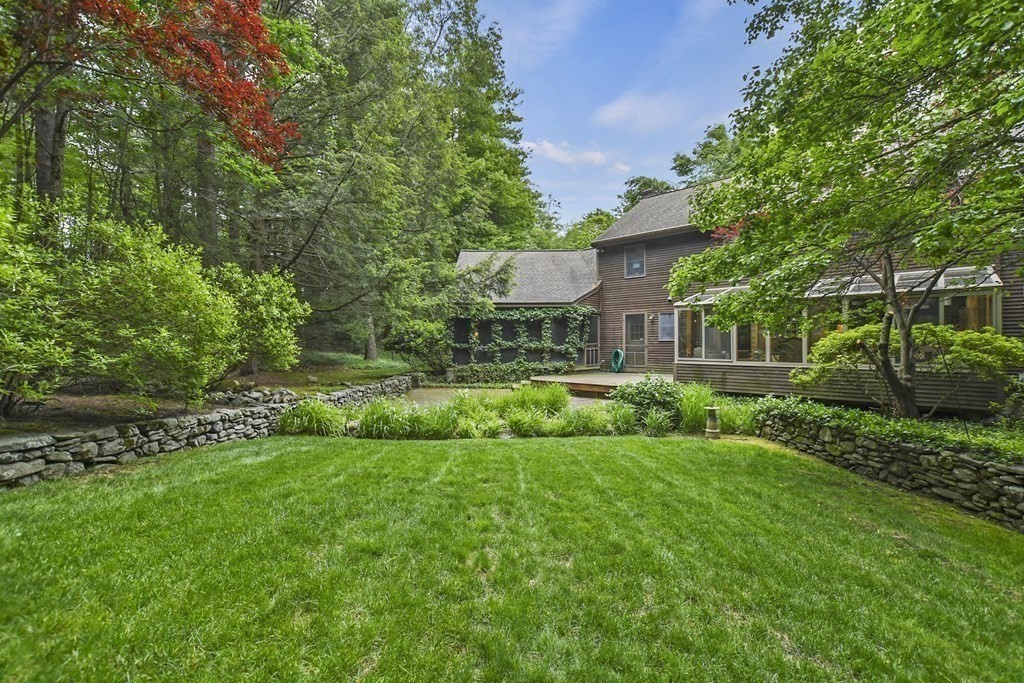 259 Hollis Road Lunenburg, MA 01462 - Photo 35 of 39 a view of a house with a big yard plants and large trees
