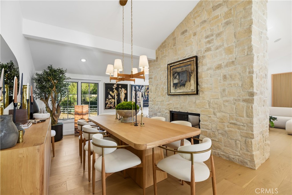 5565 Jed Smith Road Hidden Hills, CA 91302 - Photo 11 of 31 a view of a dining room with furniture window and outside view