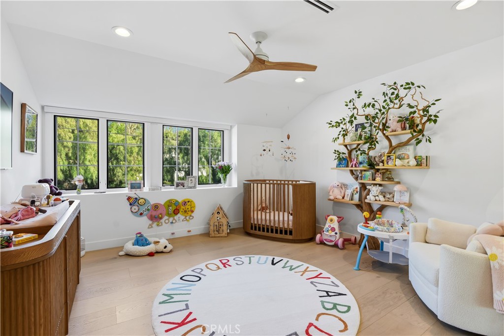 5565 Jed Smith Road Hidden Hills, CA 91302 - Photo 19 of 31 a living room with furniture and a large window