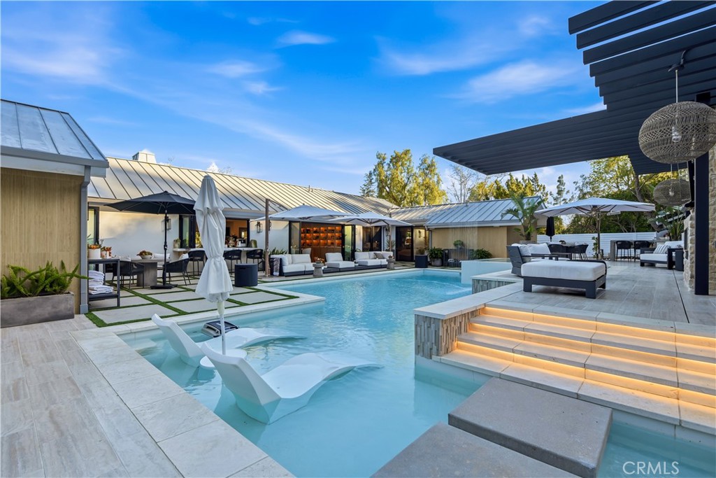 5565 Jed Smith Road Hidden Hills, CA 91302 - Photo 24 of 31 a view of a house with sitting area