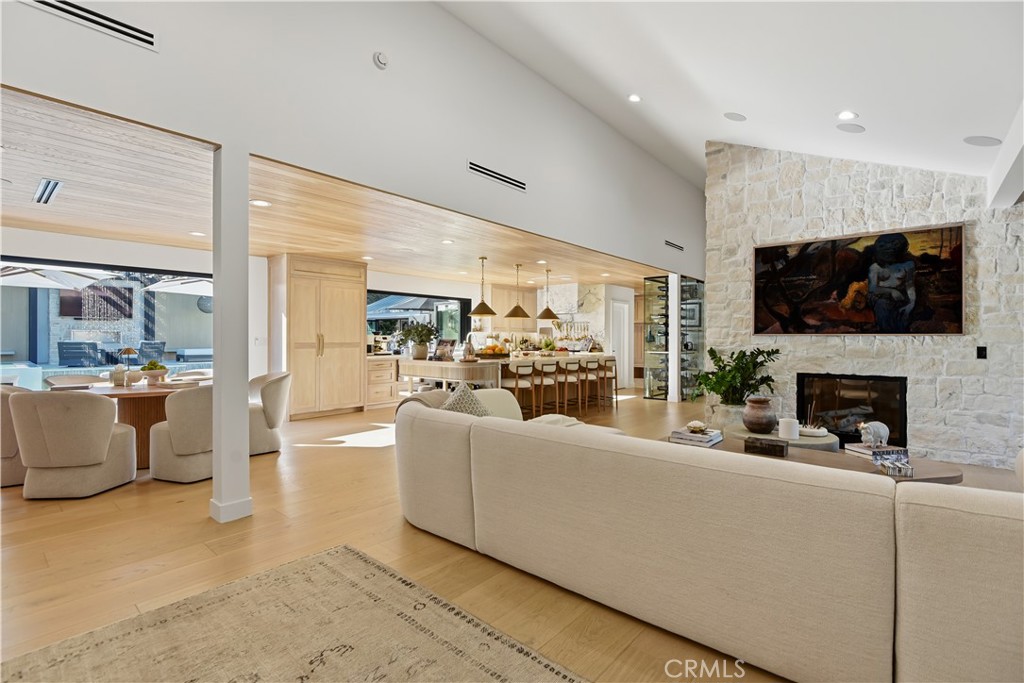 5565 Jed Smith Road Hidden Hills, CA 91302 - Photo 3 of 31 a living room with fireplace furniture and a flat screen tv