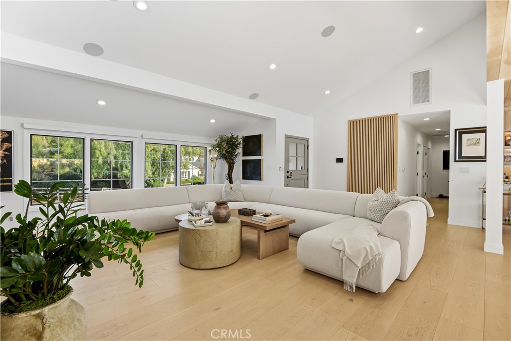 5565 Jed Smith Road Hidden Hills, CA 91302 - Photo 6 of 31 a living room with furniture and a large window