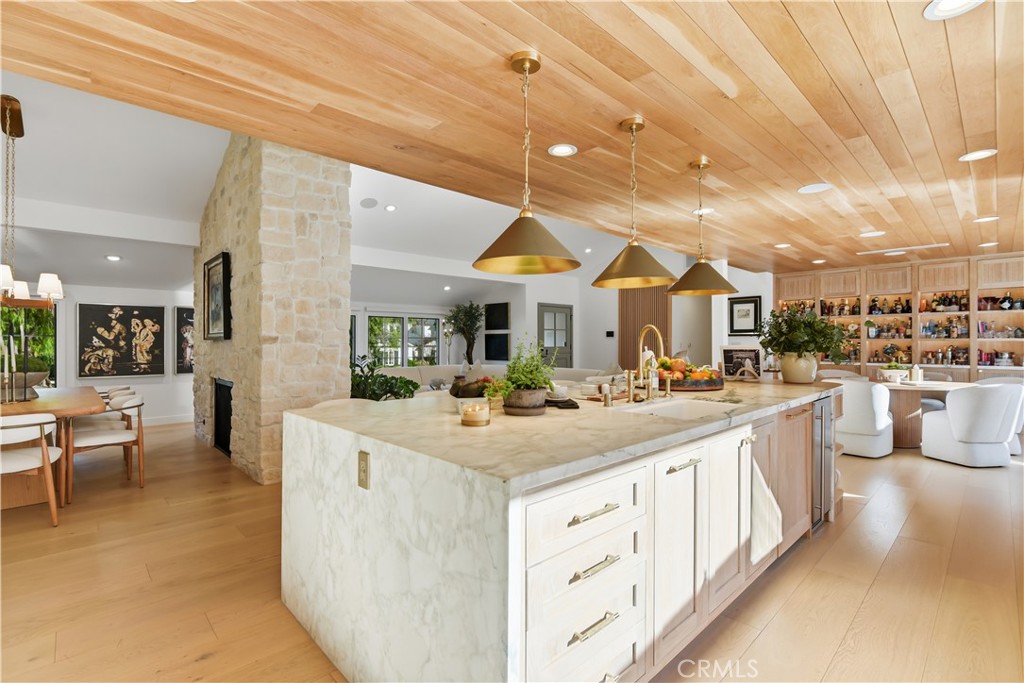 5565 Jed Smith Road Hidden Hills, CA 91302 - Photo 7 of 31 a view of a kitchen and living room