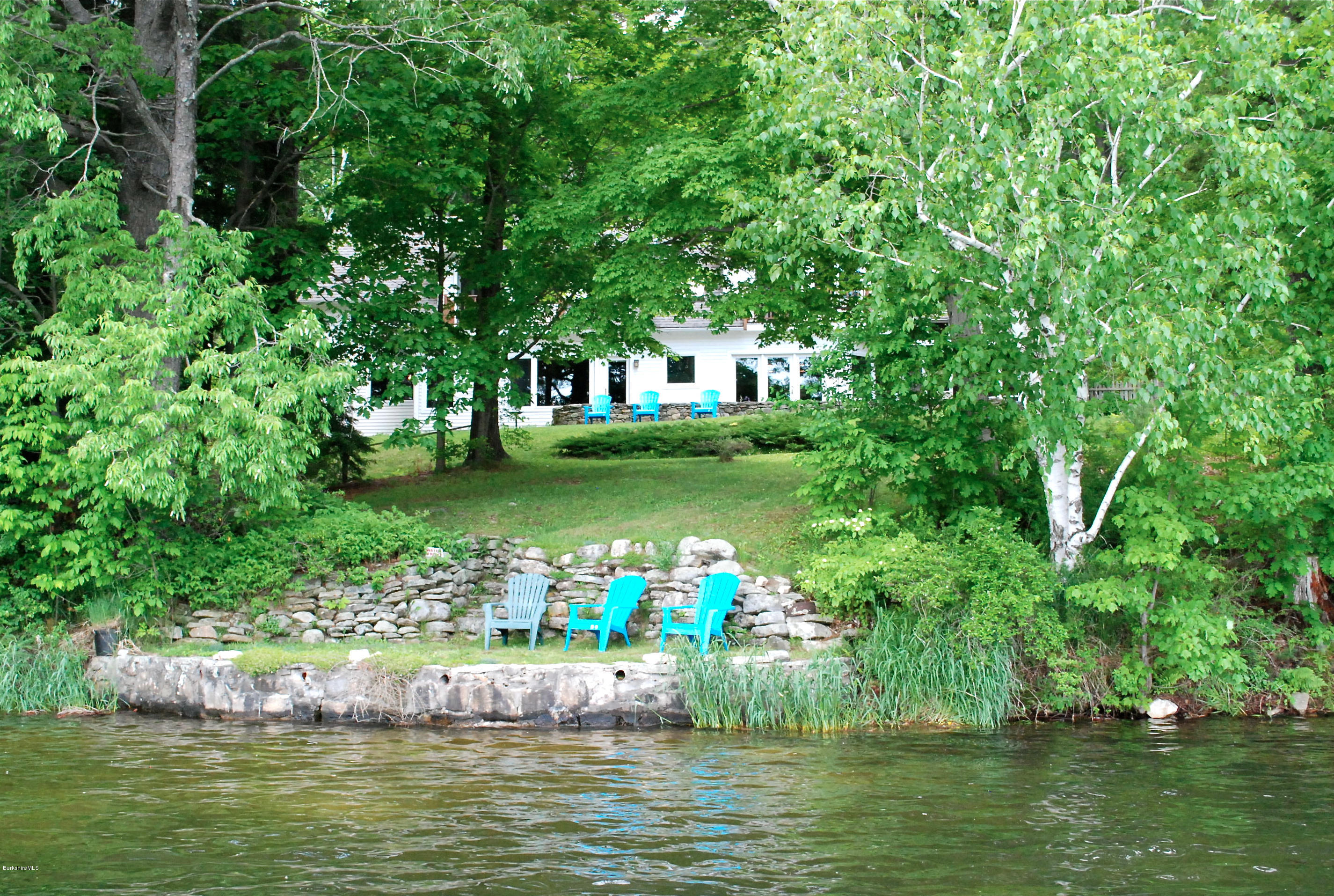20 Sylvan Road Monterey, MA 01245 - Photo 3 of 33 a view of house with swimming pool and trees in the background