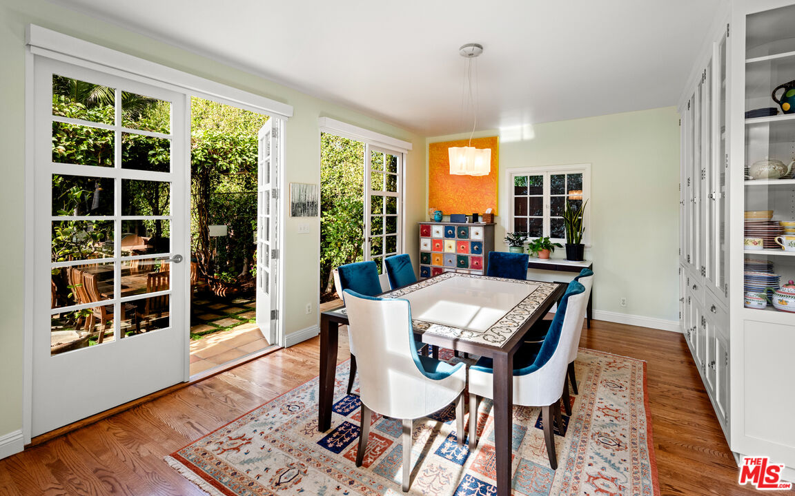 1663 Wellington Road Los Angeles, CA 90019 - Photo 12 of 45 a view of a dining room with furniture window and wooden floor