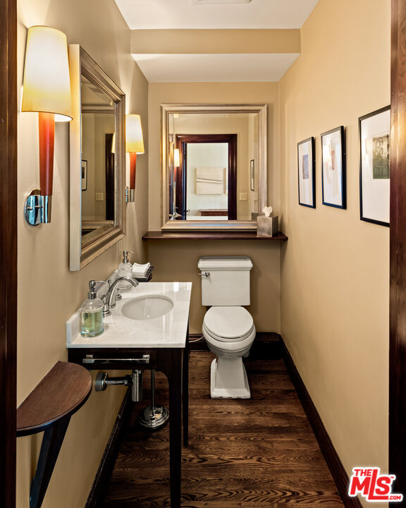 1663 Wellington Road Los Angeles, CA 90019 - Photo 13 of 45 a bathroom with a sink and a mirror
