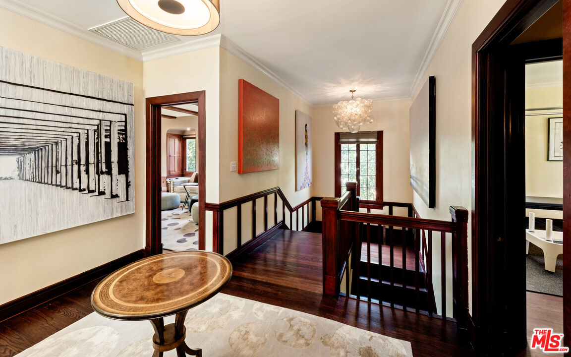 1663 Wellington Road Los Angeles, CA 90019 - Photo 16 of 45 a dining room with furniture and wooden floor