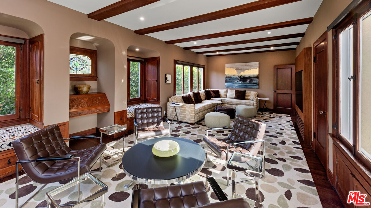 1663 Wellington Road Los Angeles, CA 90019 - Photo 19 of 45 a living room with furniture and a fireplace
