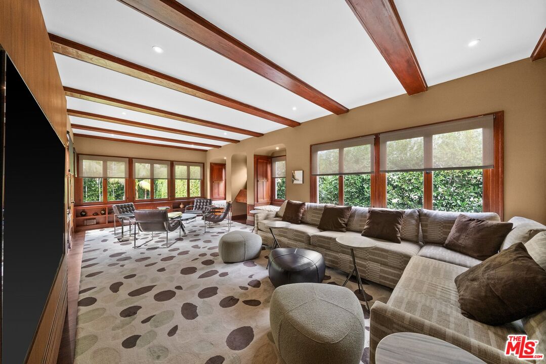 1663 Wellington Road Los Angeles, CA 90019 - Photo 21 of 45 a living room with furniture and a large window
