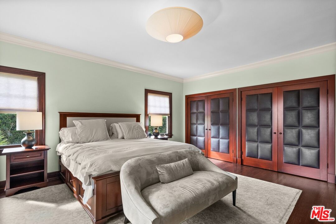 1663 Wellington Road Los Angeles, CA 90019 - Photo 23 of 45 a bedroom with a large bed and a couch