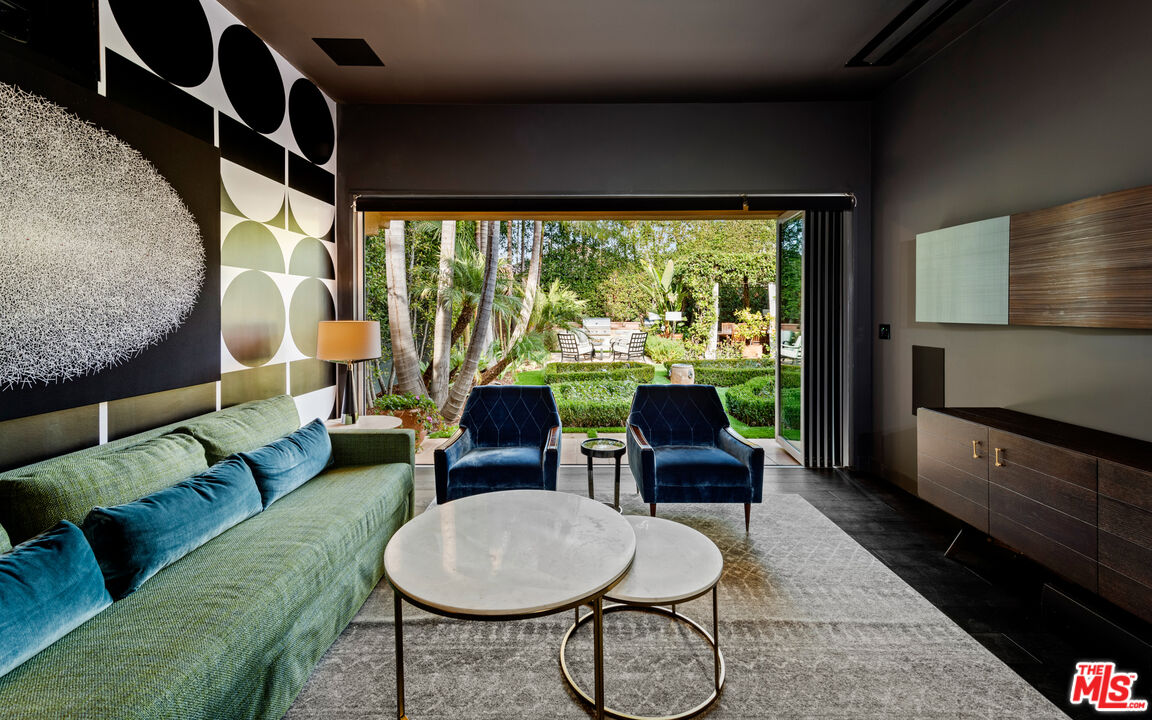 1663 Wellington Road Los Angeles, CA 90019 - Photo 32 of 45 a living room with furniture and a large window