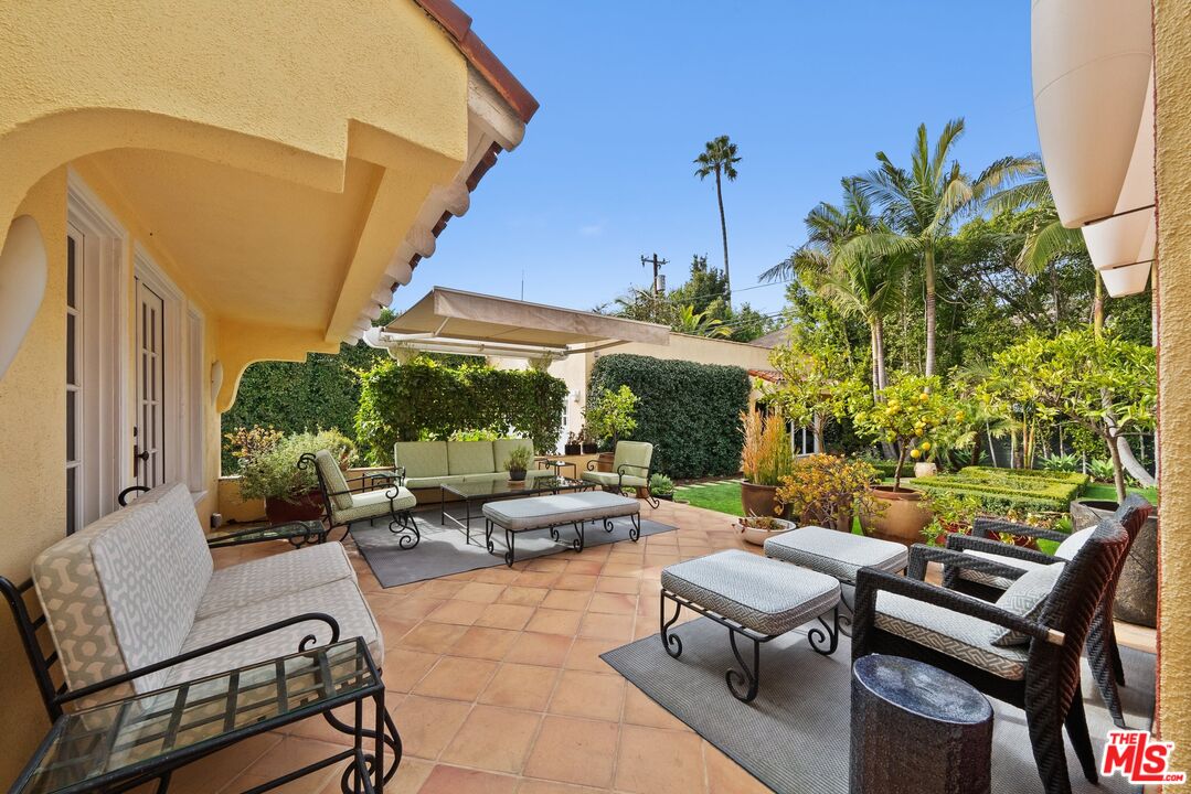 1663 Wellington Road Los Angeles, CA 90019 - Photo 42 of 45 a building outdoor space with patio furniture