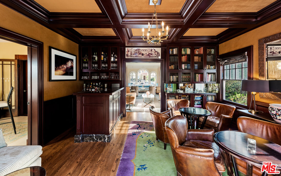 1663 Wellington Road Los Angeles, CA 90019 - Photo 5 of 45 a living room with fireplace furniture and a large window