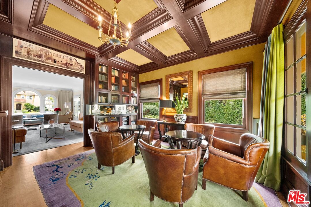 1663 Wellington Road Los Angeles, CA 90019 - Photo 6 of 45 a living room with patio furniture and a large window