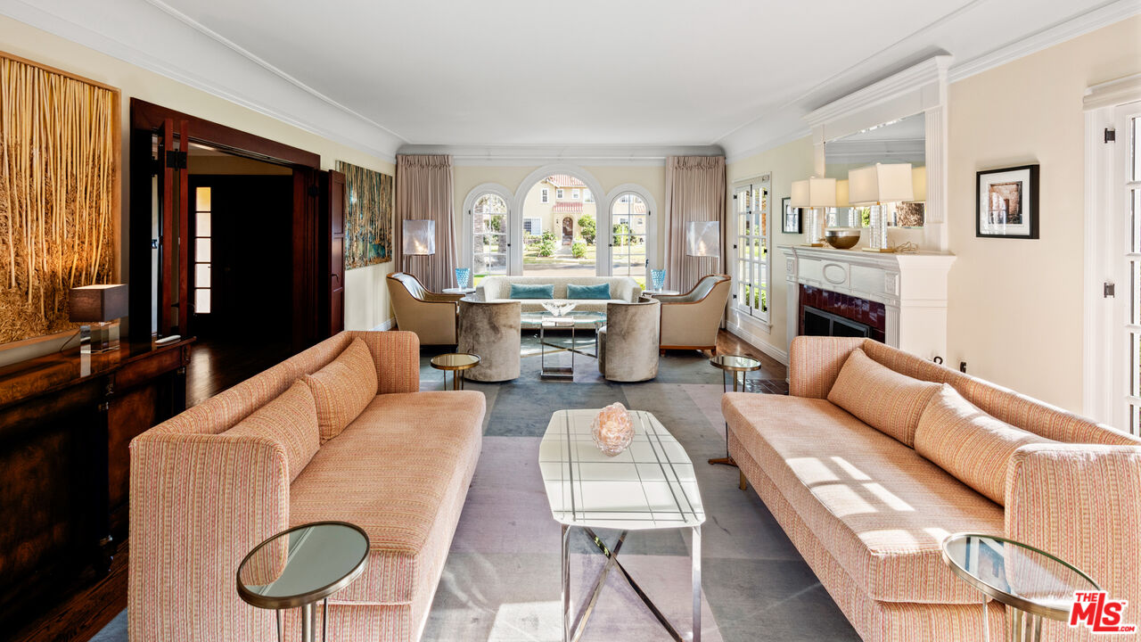 1663 Wellington Road Los Angeles, CA 90019 - Photo 7 of 45 a living room with furniture and a large window