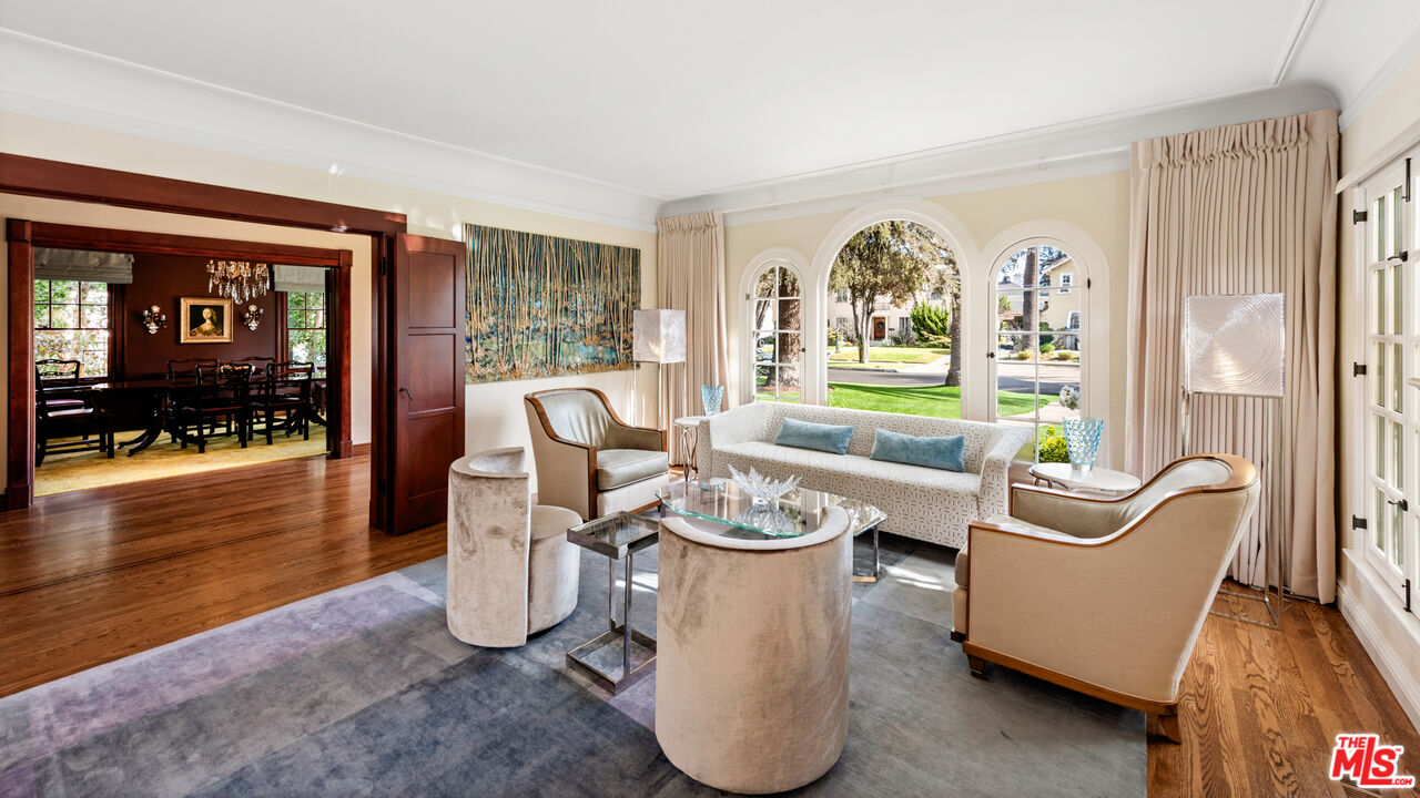1663 Wellington Road Los Angeles, CA 90019 - Photo 8 of 45 a living room with furniture and a large window